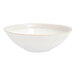 A white Nosse stoneware bowl with a gold rim.