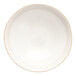 A white stoneware bowl with a gold rim.