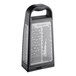 A close-up of a silver and black Microplane Elite box grater with a handle.