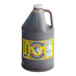A grey jug of Pickapeppa Spicy Mango Sauce with a yellow label.