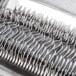 A close-up of a Hobart LIFT-STAR Star Blades liftout unit for a meat tenderizer.