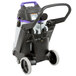 A black and purple ProTeam ProGuard 20 wet/dry vacuum cleaner on wheels.