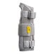 A close-up of a grey 3M Futuro Deluxe wrist brace with yellow straps.