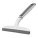 A white and grey 3M Scotch-Brite squeegee with a handle.