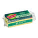 A plastic wrapped pack of 3 green and yellow Scotch-Brite heavy-duty scrub sponges.