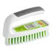 A green and white 3M Scotch-Brite hand and nail brush with a green handle.