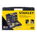 A black and yellow Stanley tool box with tools in it.