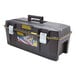 A Stanley Black structural foam toolbox on a table.