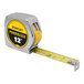 A Stanley PowerLock measuring tape with a yellow and black label.