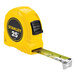 A close-up of a yellow Stanley 25' tape measure.