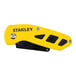 A Stanley yellow and black metal folding utility knife with a heavy-duty blade.