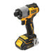 A yellow and black DeWalt cordless drill with batteries and charger.