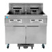 A Frymaster electric floor fryer with two drawers on wheels.