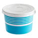 A blue and white paper container with a plastic lid.