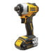 A yellow and black DeWalt cordless drill.