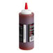 A close up of a Capital City Sweet Hot Mambo Sauce bottle with a white cap.
