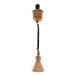 A Hanson Heat Lamp with a bright copper finish and black cord.