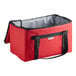 A red and black Sterno insulated delivery food carrier bag.