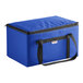 A Sterno royal blue nylon insulated food carrier with black straps.