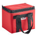 A red nylon insulated delivery food carrier with black straps.