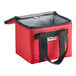 A red and black Sterno insulated delivery food carrier with a black handle.