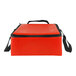 A red lunch bag with black handles.