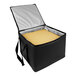 A black and silver Sterno insulated food carrier with a yellow square inside.