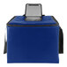 A royal blue Sterno insulated milk crate bag with a black strap and zipper.