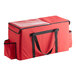 A red Sterno insulated food delivery bag with black straps.