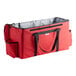 A red Sterno insulated food carrier with two compartments.