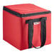 A red Sterno insulated delivery food carrier with black straps.