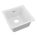 A white Zurn Elkay Quartz Classic square sink with a drain hole in the middle.