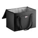 A black and grey Sterno insulated catering food carrier bag with a zipper and a handle.