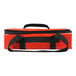 A red bag with black straps.