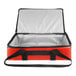 A red and black Sterno insulated delivery bag with a black strap.