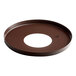 A brown circular lid with a white circle in the middle.