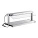 A ServIt stainless steel heated buffet warmer with glass top on a counter.