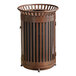 A brown metal Lancaster Table & Seating outdoor trash can with slatted sides and a flat lid.