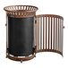 A brown steel slatted outdoor trash can with a flat lid and door.