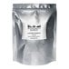 A silver bag of Rainforest Supply Organic Lucuma Powder with a white label.