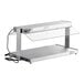 A silver ServIt stainless steel heated buffet warmer with a clear glass top on a counter.