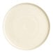 An ivory stoneware plate with a white rim.