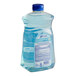 A close-up of a Dial Complete Spring Water Liquid Hand Soap refill bottle with a blue label and cap.