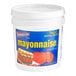 An Admiration Extra Heavy Mayonnaise 4 gallon bucket with a white and blue label and a red and yellow lid.