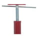 A red and silver metal telescoping floor jack with a metal screw on top.