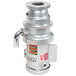 A silver metal Hobart commercial garbage disposer cylinder with a pipe.