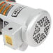 A close up of the silver motor for a Hobart commercial garbage disposer.