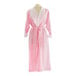 A Telegraph Hill pink seersucker bath robe with white trim on a mannequin.