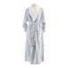 A navy seersucker bath robe with blue and white stripes on a mannequin.
