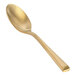 A Front of the House Matte Brass Demitasse Spoon with a golden handle.